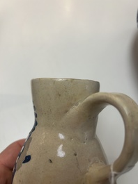 A very rare polychrome Antwerp maiolica 'IHS' jug, 16th C.
