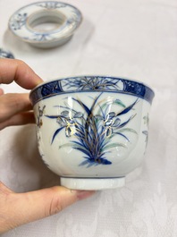 Three Chinese enamelled blue and white covered bowls on stands and a famille rose vase, Kangxi and Tongzhi mark, 19/20th C.