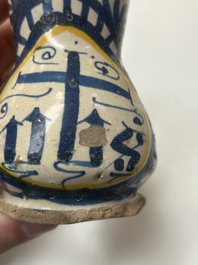A very rare polychrome Antwerp maiolica 'IHS' jug, 16th C.