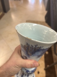 An extremely rare blue, white and manganese Dutch Delft chinoiserie beaker vase after a silver model, late 17th C.