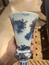 An extremely rare blue, white and manganese Dutch Delft chinoiserie beaker vase after a silver model, late 17th C.