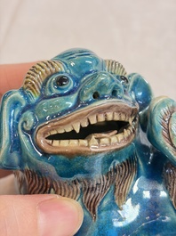 A pair of Chinese polychrome lions, a celadon-glazed goat, a yellow-glazed bowl and a sancai-glazed conical bowl, Chenghua mark, 19/20th C.