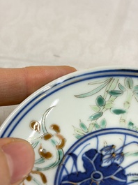 Three Chinese enamelled blue and white covered bowls on stands and a famille rose vase, Kangxi and Tongzhi mark, 19/20th C.