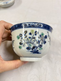 Three Chinese enamelled blue and white covered bowls on stands and a famille rose vase, Kangxi and Tongzhi mark, 19/20th C.
