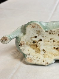 A pair of Chinese polychrome lions, a celadon-glazed goat, a yellow-glazed bowl and a sancai-glazed conical bowl, Chenghua mark, 19/20th C.