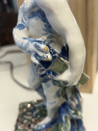 An important pair of polychrome Dutch Delft cashmere palette figures of Diana and Mercury, dated 172(?)