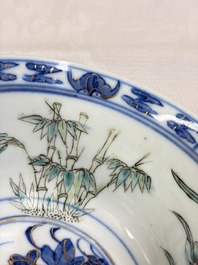 Three Chinese enamelled blue and white covered bowls on stands and a famille rose vase, Kangxi and Tongzhi mark, 19/20th C.