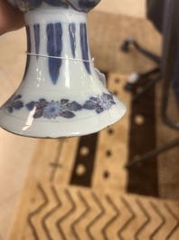 An extremely rare blue, white and manganese Dutch Delft chinoiserie beaker vase after a silver model, late 17th C.