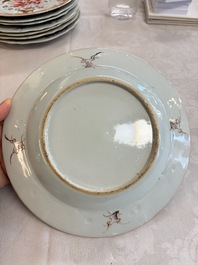 Eight Chinese famille rose plates with floral design and a 'Rooster' teapot, Yongzheng/Qianlong