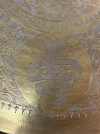A Chinese brass and hongmu 'Yan Nian Yi Shou 延年益壽' folding table, 19/20th C.