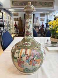 A Chinese Canton famille rose covered bottle vase and a teapot, 19th C.