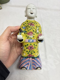 Six Chinese famille rose figures, one with a 'Lotus Throne' stand, 19th C.