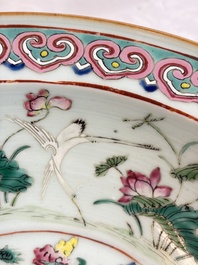 A large Chinese famille rose 'Dragon' basin and a basin with floral design, 19th C.