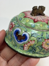A Chinese Canton enamel green-ground three-piece altar set, 19th C.