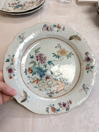 Eight Chinese famille rose plates with floral design and a 'Rooster' teapot, Yongzheng/Qianlong