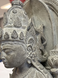 A Javanese carved stone figure of Prajnaparamita, 20th C.