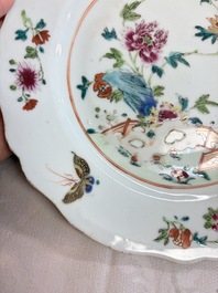 Eight Chinese famille rose plates with floral design and a 'Rooster' teapot, Yongzheng/Qianlong