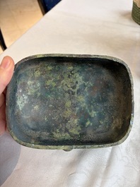 An inscribed Chinese archaic bronze food vessel and cover with double-dragon design, 'Yu Fang Ding 圉方鼎', Western Zhou