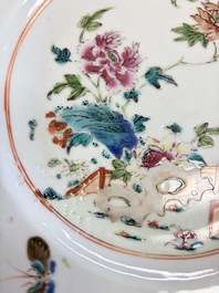 Eight Chinese famille rose plates with floral design and a 'Rooster' teapot, Yongzheng/Qianlong