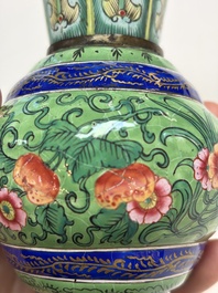 A Chinese Canton enamel green-ground three-piece altar set, 19th C.
