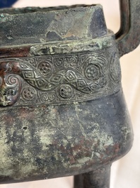 An inscribed Chinese archaic bronze food vessel and cover with double-dragon design, 'Yu Fang Ding 圉方鼎', Western Zhou