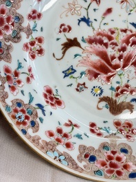 Eight Chinese famille rose plates with floral design and a 'Rooster' teapot, Yongzheng/Qianlong