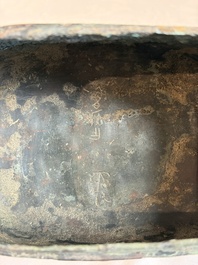 An inscribed Chinese archaic bronze food vessel and cover with double-dragon design, 'Yu Fang Ding 圉方鼎', Western Zhou