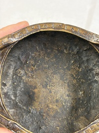 A Chinese bronze tripod 'Dragon' censer with two handles, Xuande mark, 19th C.