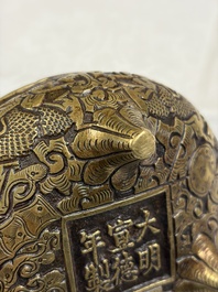 A Chinese bronze tripod 'Dragon' censer with two handles, Xuande mark, 19th C.