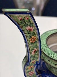 A Chinese Canton enamel green-ground three-piece altar set, 19th C.