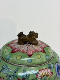 A Chinese Canton enamel green-ground three-piece altar set, 19th C.