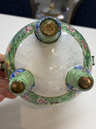 A Chinese Canton enamel green-ground three-piece altar set, 19th C.
