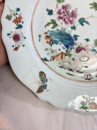 Eight Chinese famille rose plates with floral design and a 'Rooster' teapot, Yongzheng/Qianlong