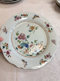 Eight Chinese famille rose plates with floral design and a 'Rooster' teapot, Yongzheng/Qianlong