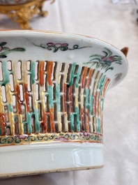 A Chinese Canton famille rose reticulated basket on stand and a gilt-bronze-mounted bowl, 19th C.