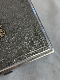 An Iranian silver and gilt cigarette case commemorating Mohammad Reza Pahlavi's coronation, 20th C.