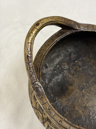 A Chinese bronze tripod 'Dragon' censer with two handles, Xuande mark, 19th C.