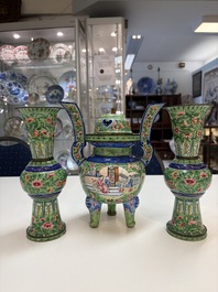 A Chinese Canton enamel green-ground three-piece altar set, 19th C.