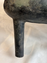 An inscribed Chinese archaic bronze food vessel and cover with double-dragon design, 'Yu Fang Ding 圉方鼎', Western Zhou