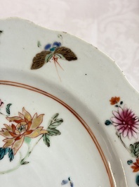 Eight Chinese famille rose plates with floral design and a 'Rooster' teapot, Yongzheng/Qianlong
