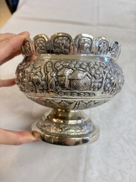 An Indian repouss&eacute; silver footed bowl, early 20th C.