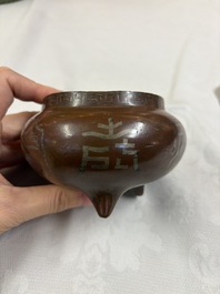 A Chinese or Vietnamese silver-inlaid bronze 'Fu Lu Shou' tripod censer,  Xuande mark, 19th C.