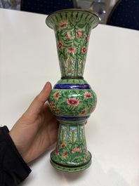 A Chinese Canton enamel green-ground three-piece altar set, 19th C.