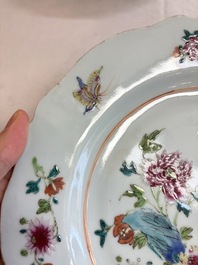 Eight Chinese famille rose plates with floral design and a 'Rooster' teapot, Yongzheng/Qianlong