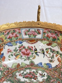 A Chinese Canton famille rose reticulated basket on stand and a gilt-bronze-mounted bowl, 19th C.