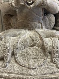 A Javanese carved stone figure of Prajnaparamita, 20th C.