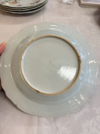 Eight Chinese famille rose plates with floral design and a 'Rooster' teapot, Yongzheng/Qianlong