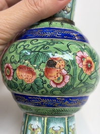 A Chinese Canton enamel green-ground three-piece altar set, 19th C.