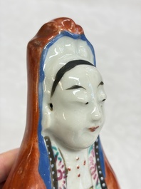 Six Chinese famille rose figures, one with a 'Lotus Throne' stand, 19th C.
