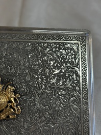An Iranian silver and gilt cigarette case commemorating Mohammad Reza Pahlavi's coronation, 20th C.